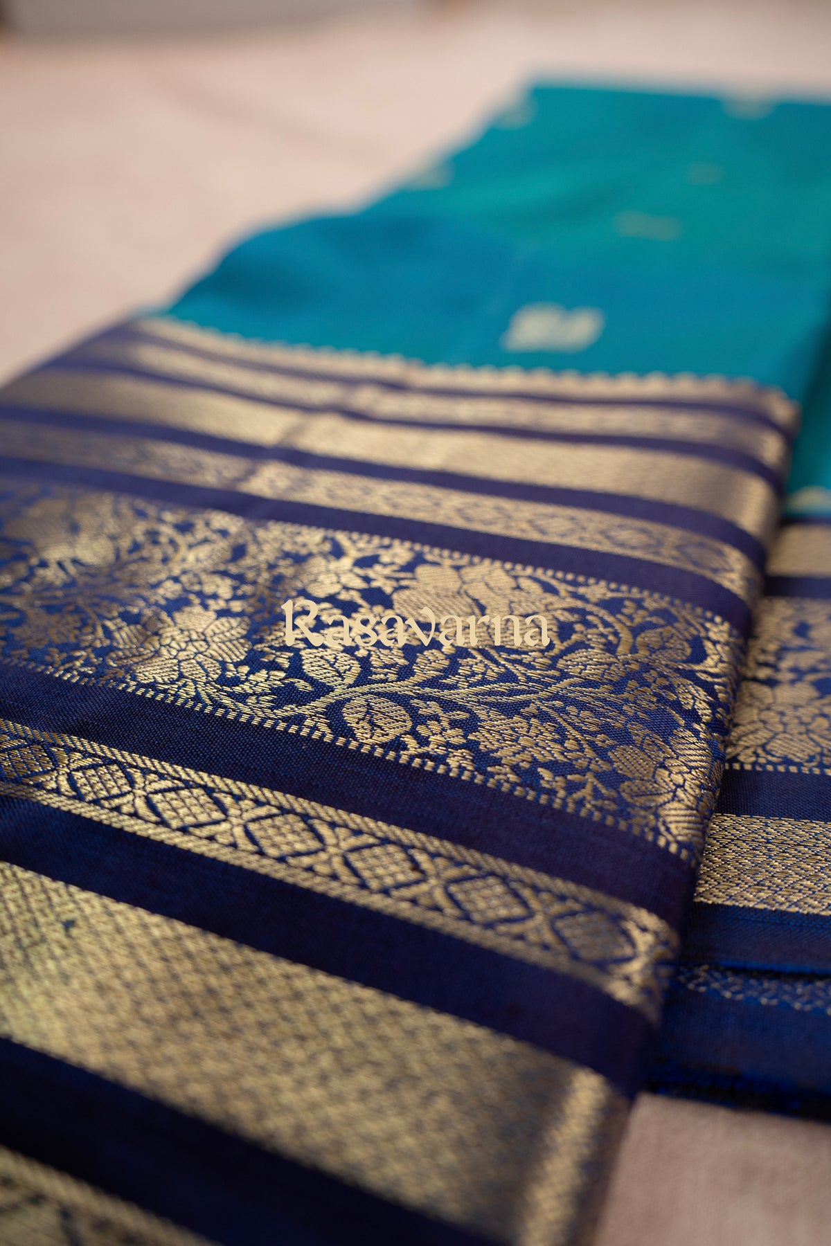 Peacock Blue Pure Silk Kanchipuram Pattu Saree with Navy Blue Border