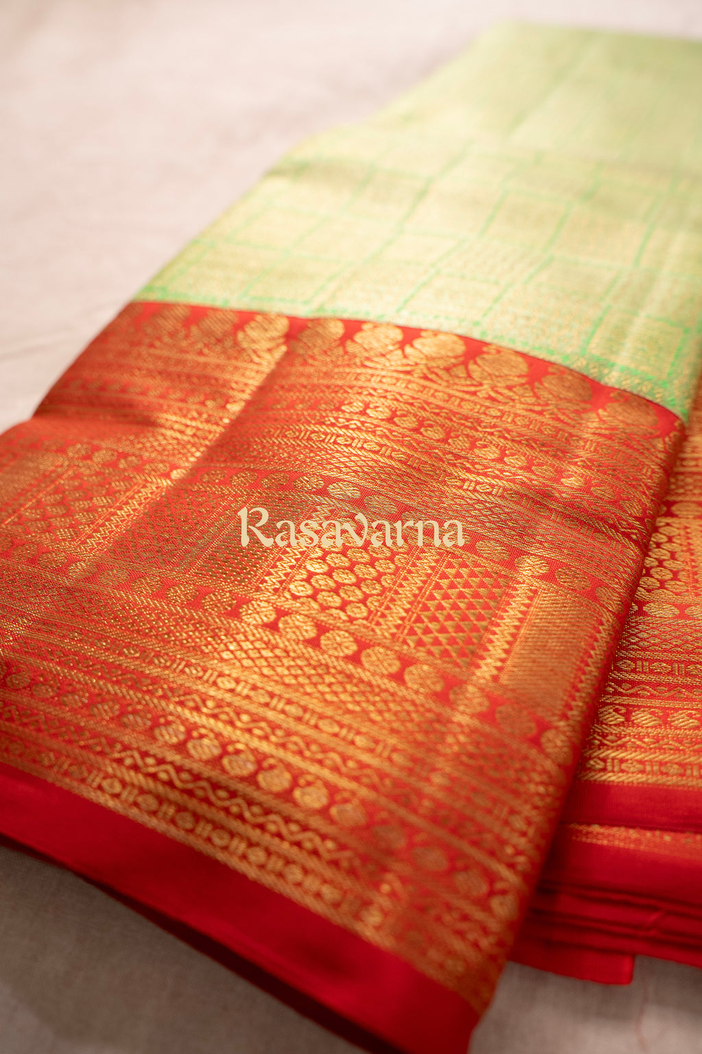 Pista Green Pure Silk Kanchipuram Pattu Saree with Red Border