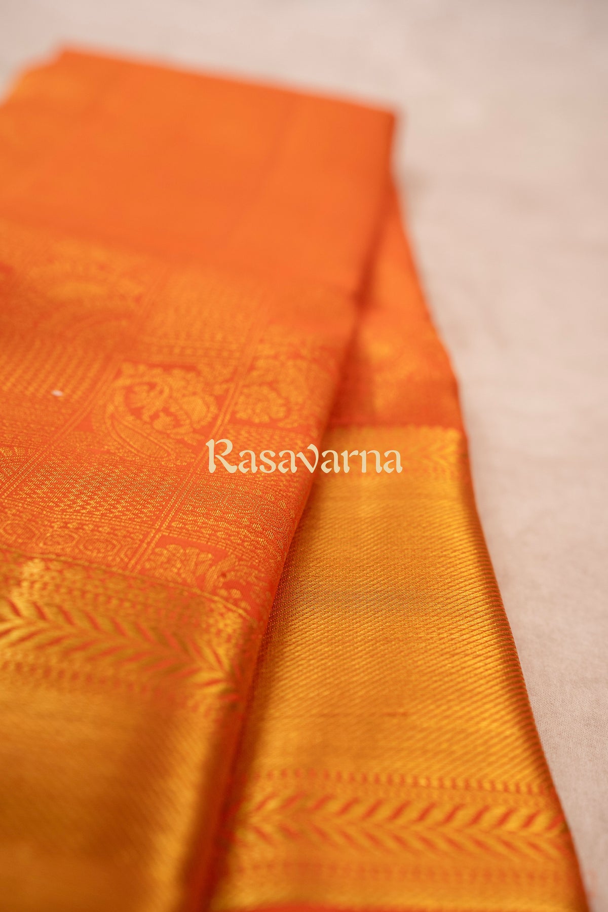 Orange Pure Silk Kanchipuram Pattu Saree with Orange Border
