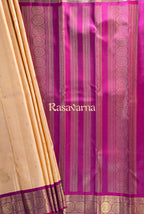 Cream Pure Silk Kanchipuram Pattu Saree with Rani Pink Border