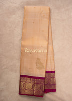 Cream Pure Silk Kanchipuram Pattu Saree with Rani Pink Border