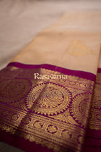Cream Pure Silk Kanchipuram Pattu Saree with Rani Pink Border
