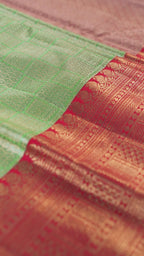 Pista Green Pure Silk Kanchipuram Pattu Saree with Red Border