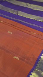 Rust Orange Pure Silk Kanchipuram Pattu Saree with Violet Border